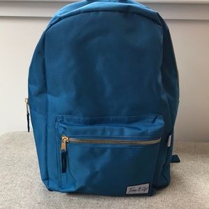 Tone it Up blue backpack